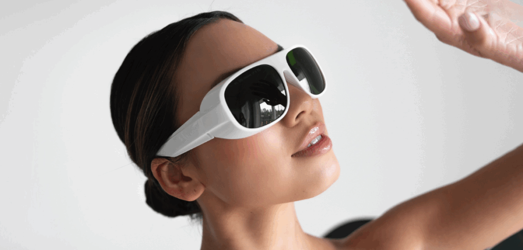 Woman wearing white glasses getting 3d miracle laser