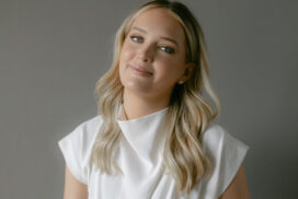 Sarah Sullivan sitting in a chair