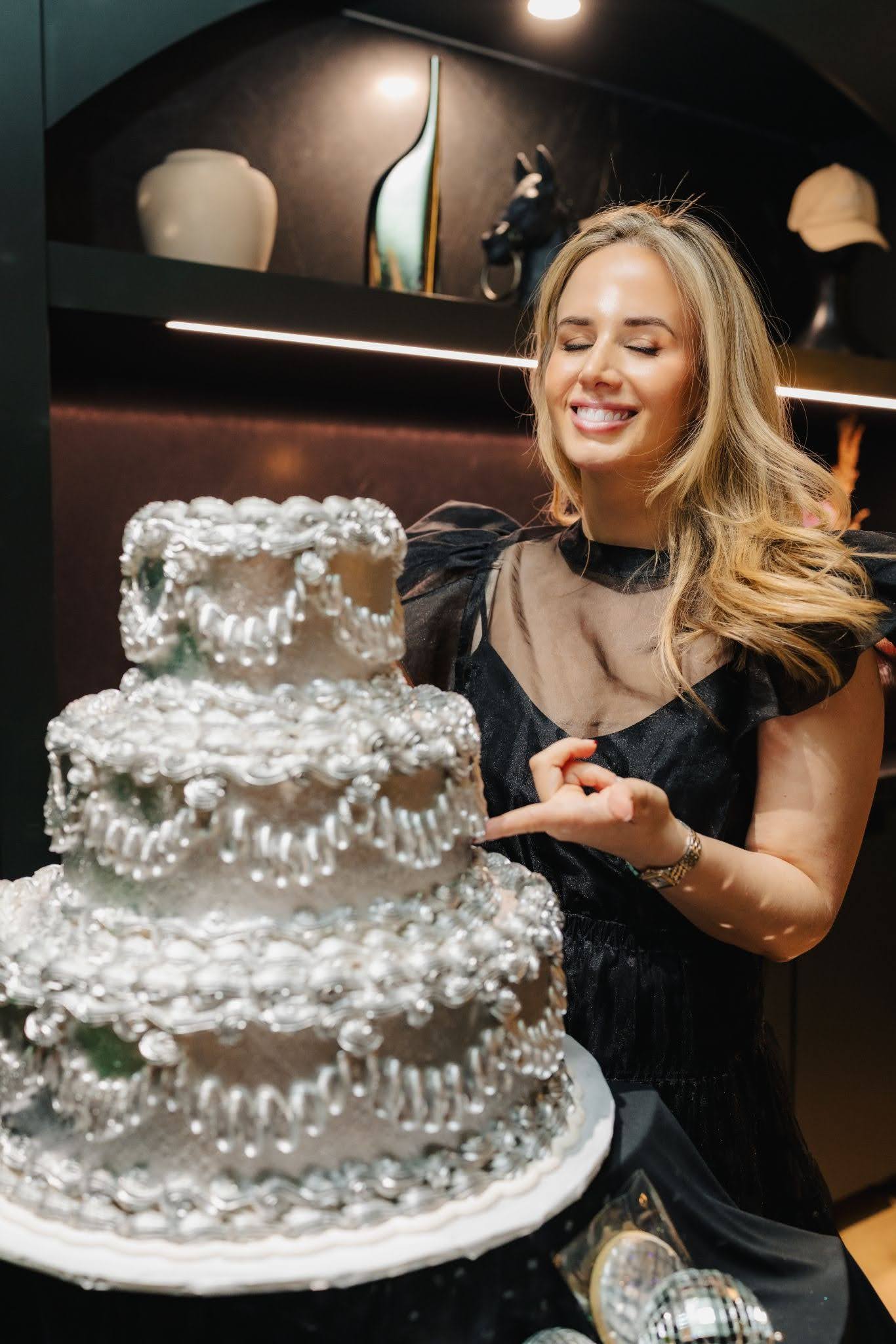 Celebrating the Cult Aesthetics birthday with a silver tiered cake